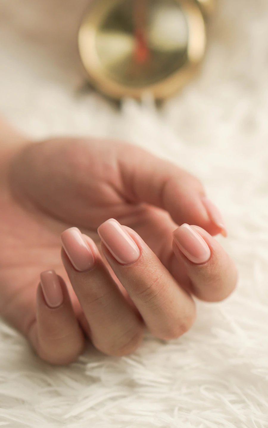 Soft nude almond manicure detail